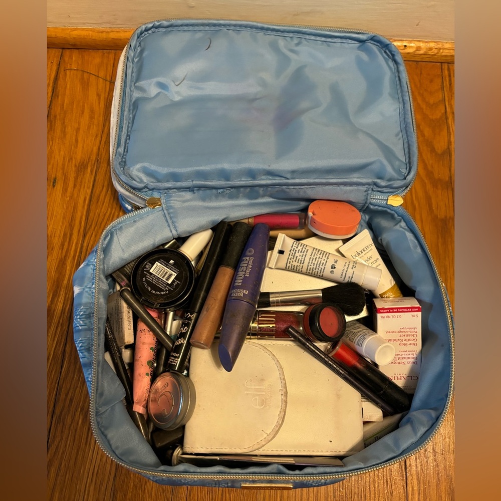 Makeup bag with unused/sample makeup, tools and brushes of all sizes